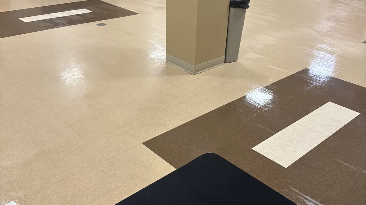Polished VCT floor in the worship hall at Grace Methodist Church, maintained by Frisco Brothers
