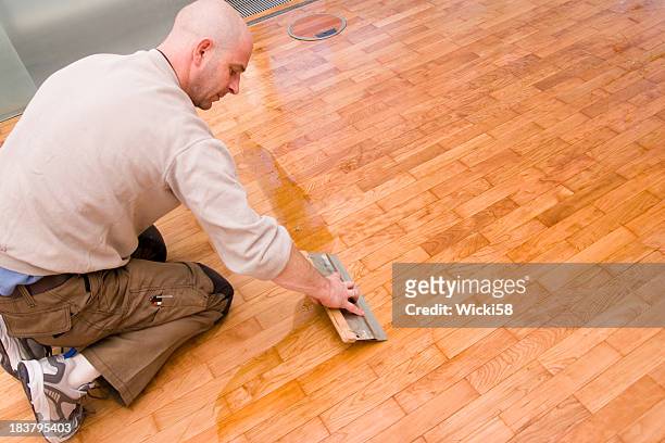 a man doing floor waxing